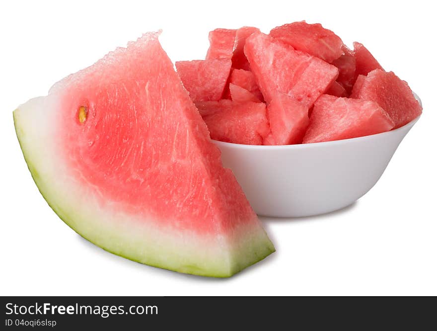 Bowl with watermelon and slice on white background