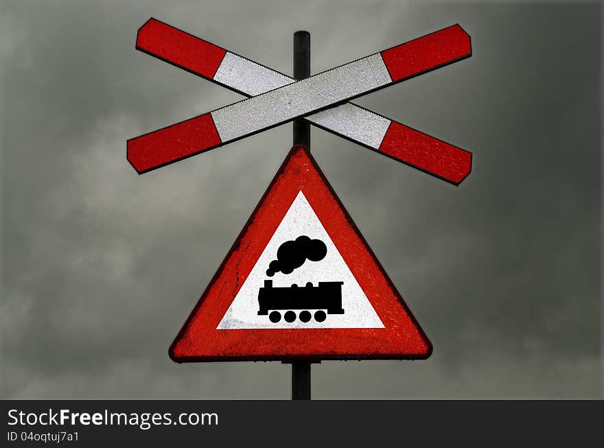 Warning of an unguarded railway crossing in bad weather with light rain (with headlight on). Warning of an unguarded railway crossing in bad weather with light rain (with headlight on)