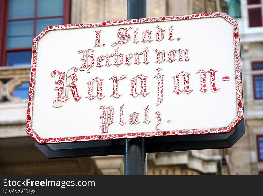 Street Sign at Famous Vienna Herbert von Karajan Platz in Vienna, Austria