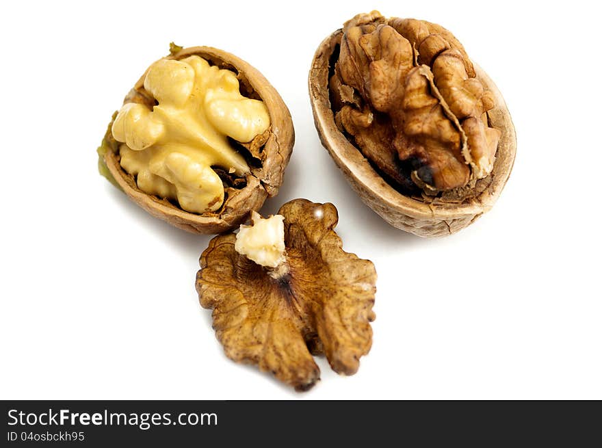 Dry walnuts on a white background