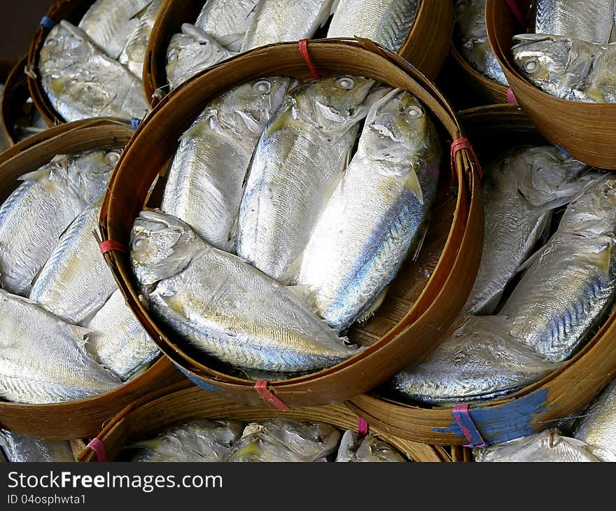 Steamed mackerel fish on the bamboo round basket seafood in cheap price from seafood market