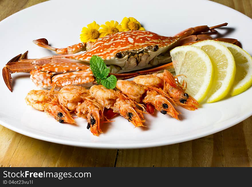 Crab and shrimp tray, on the table. Crab and shrimp tray, on the table.