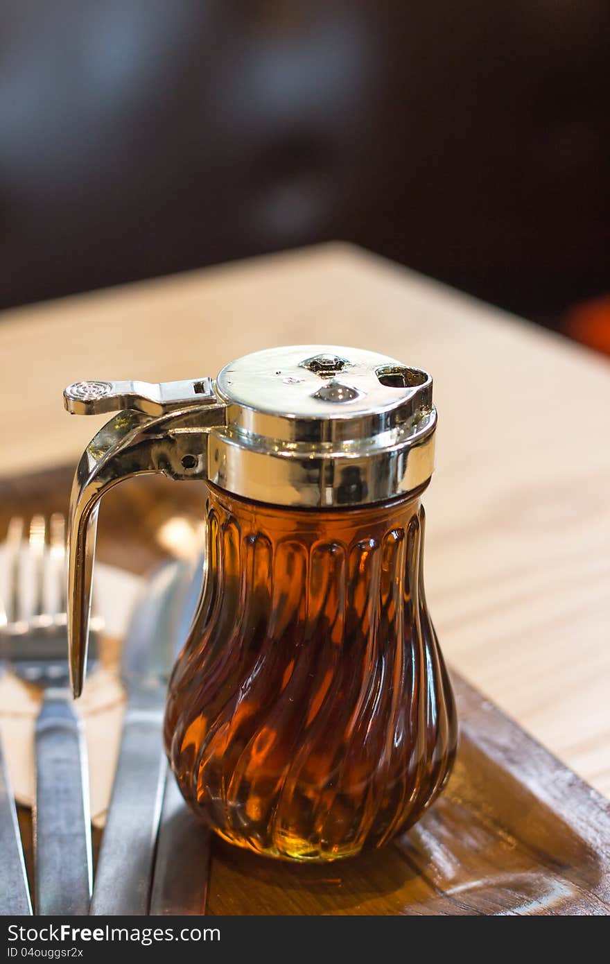 Honey in jug on the table