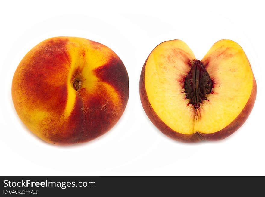 Ripe peach fruit on a white background. Ripe peach fruit on a white background