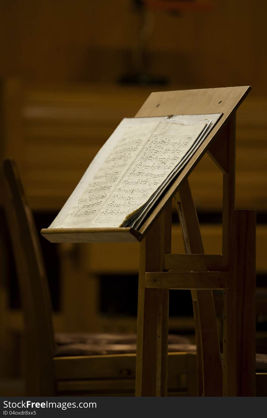 At the сonservatoire's musical score is on the stand. At the сonservatoire's musical score is on the stand