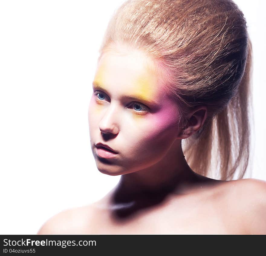 Beautiful blonde woman face with bright colorful make-up. Beautiful blonde woman face with bright colorful make-up