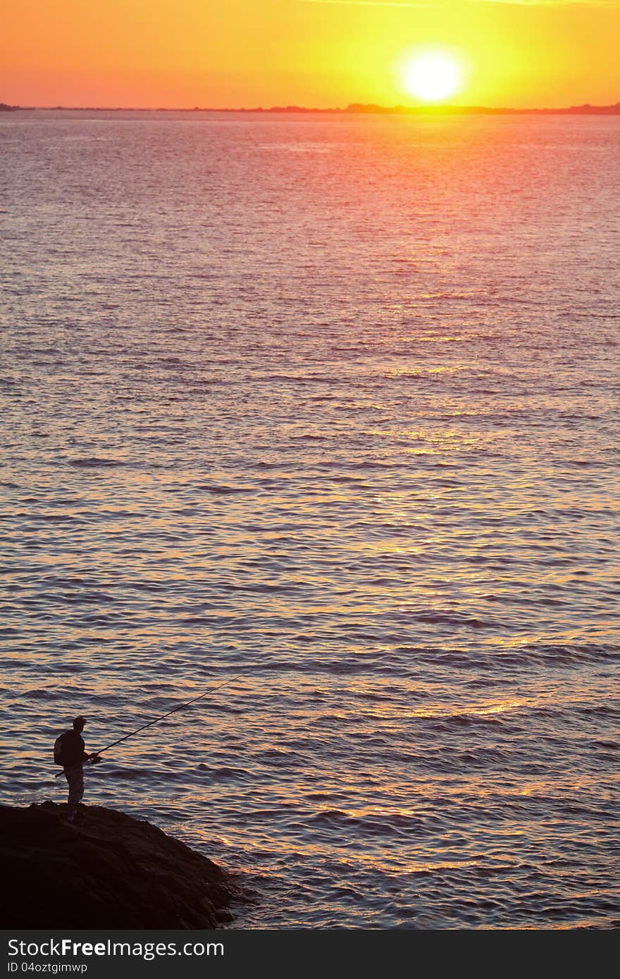 Angler at the coast of Brittany