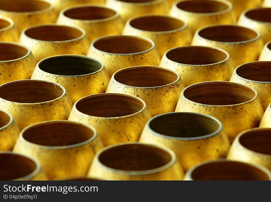 Mini monk's alms bowl for donate some coins usually found in Thai temple. Mini monk's alms bowl for donate some coins usually found in Thai temple