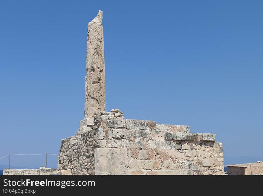 Ancient Aigina site with the famous Colona at Aegina island in Greece. Ancient Aigina site with the famous Colona at Aegina island in Greece.