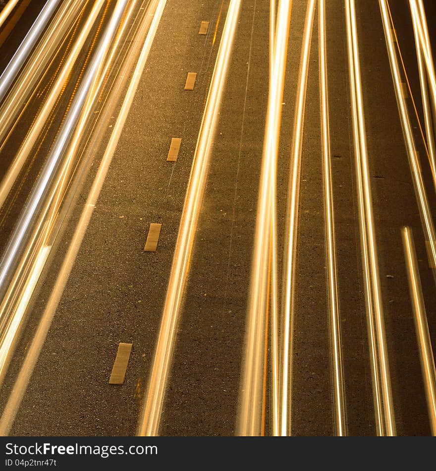 Light vehicles on the road at night. Light vehicles on the road at night.