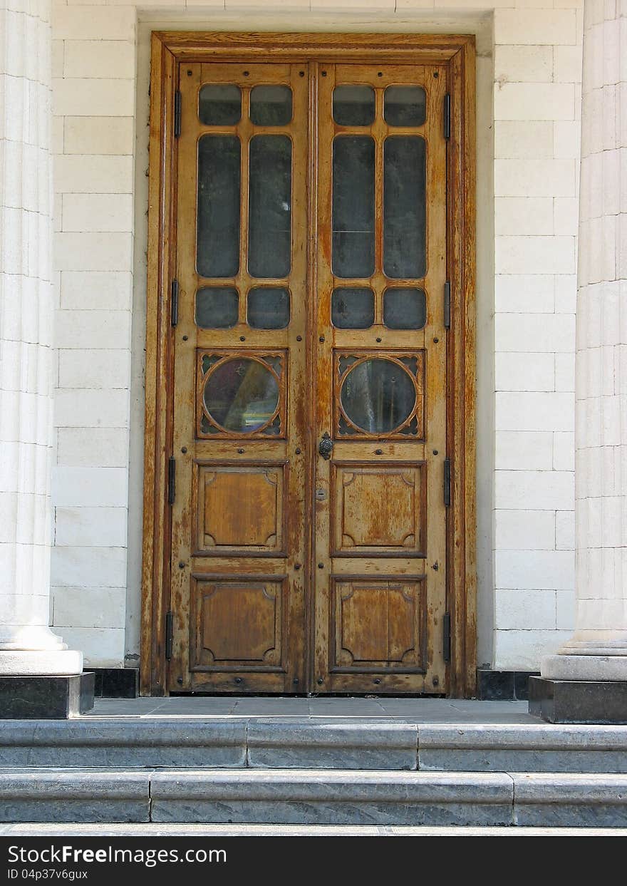 Ancient architecture entrance with old wooden door