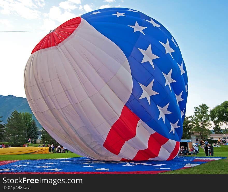 American flad hot air balloon facing a storm. American flad hot air balloon facing a storm