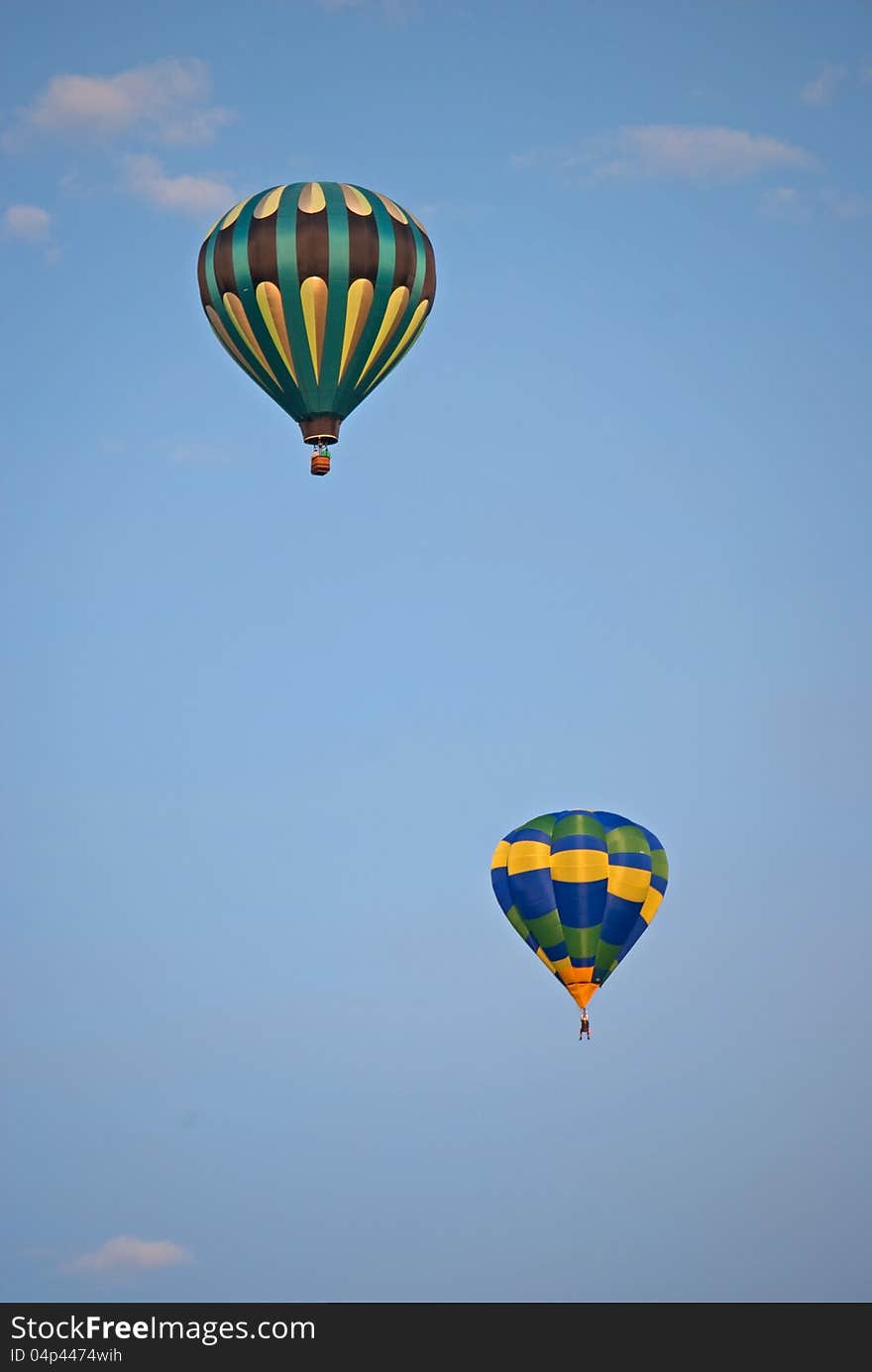 Hot air balloon against a blue sky. Hot air balloon against a blue sky