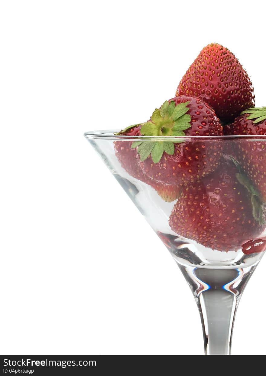 Strawberry in a glass on a white background. Strawberry in a glass on a white background