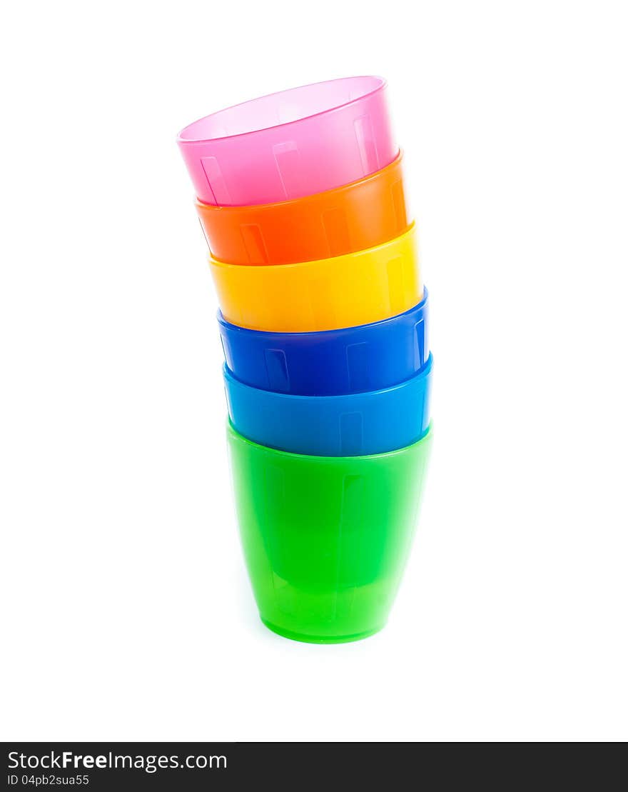 Stack of colorful plastic cups isolated