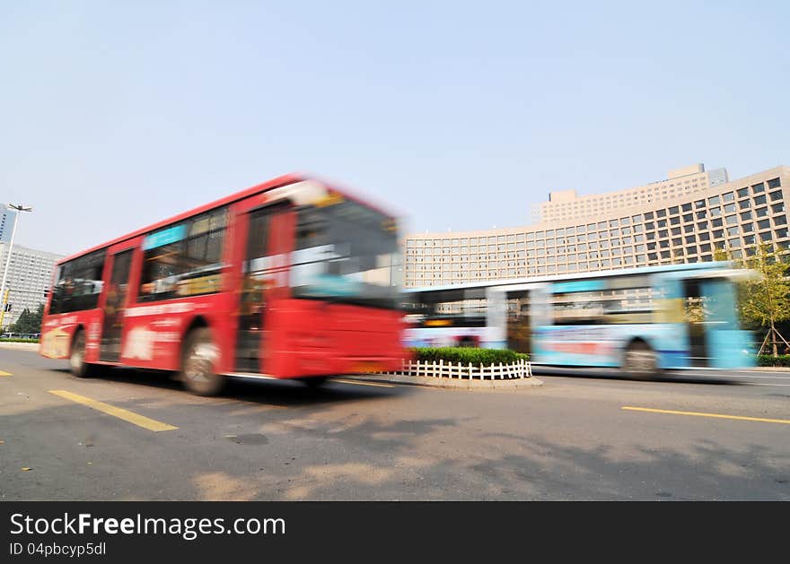 A bus running on the city highway