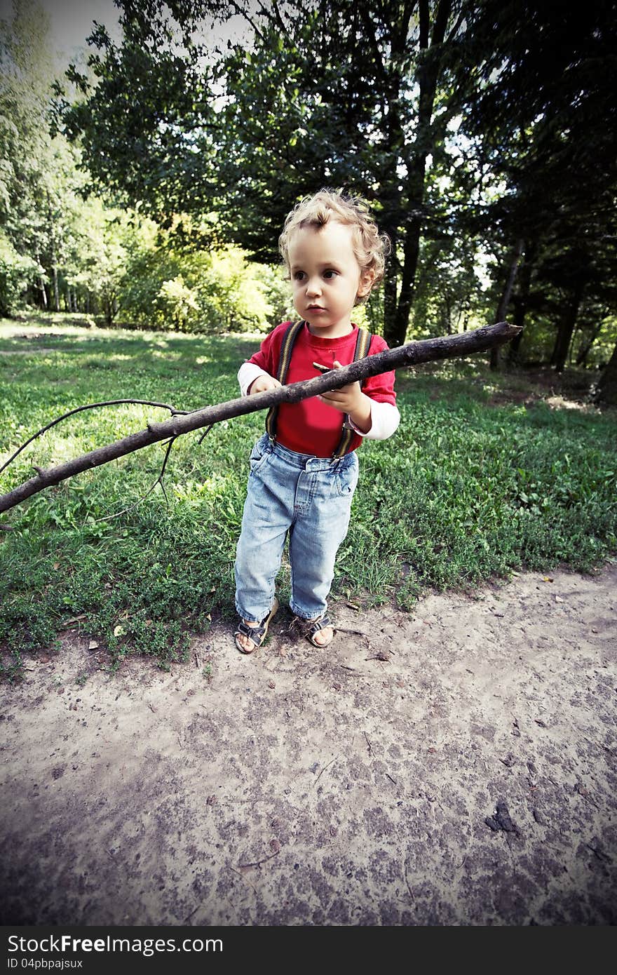 Frightened boy walks in the woods