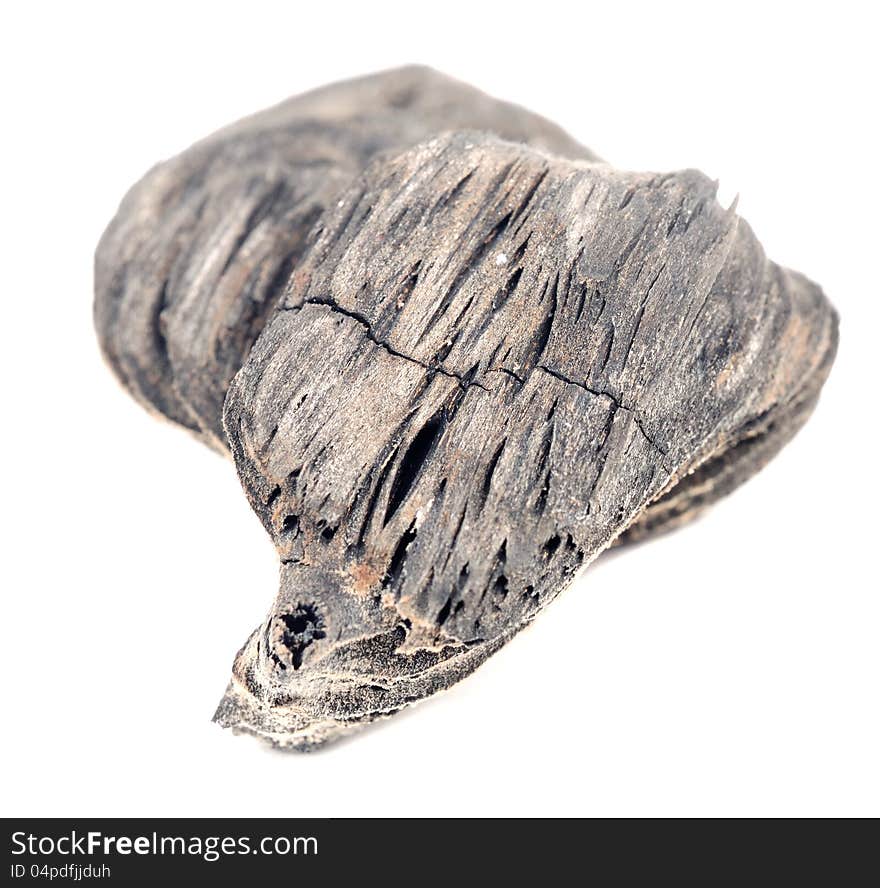 BA close-up of wood charcoal isolated against a white background