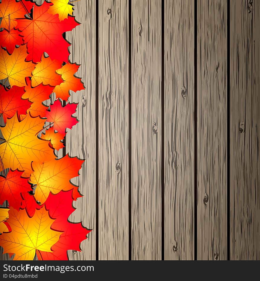 Autumn Leaves Over Wooden Background.