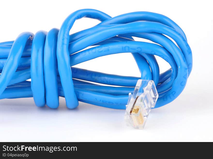 Blue network cable and connector on white background