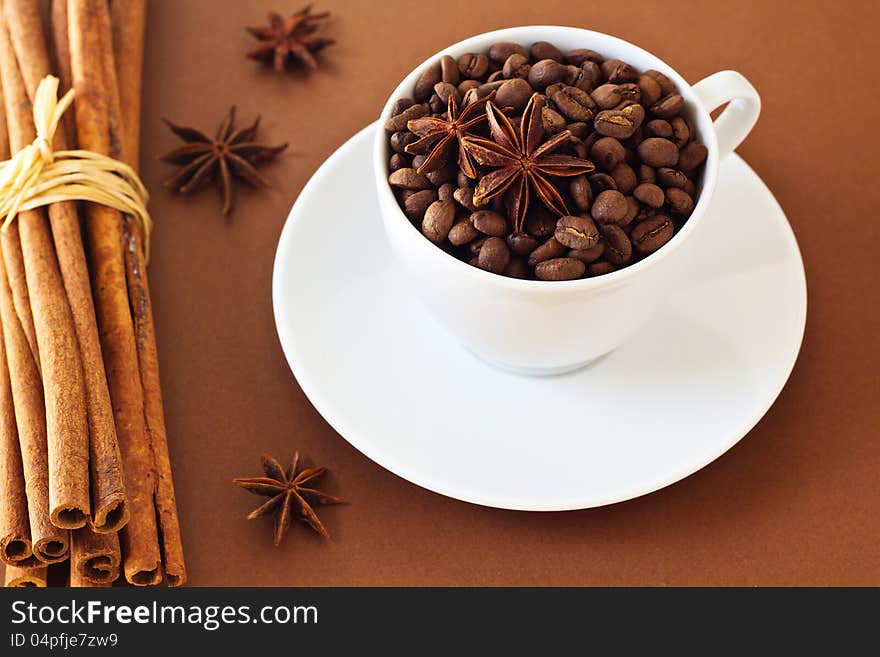 Coffee beans in a white cup