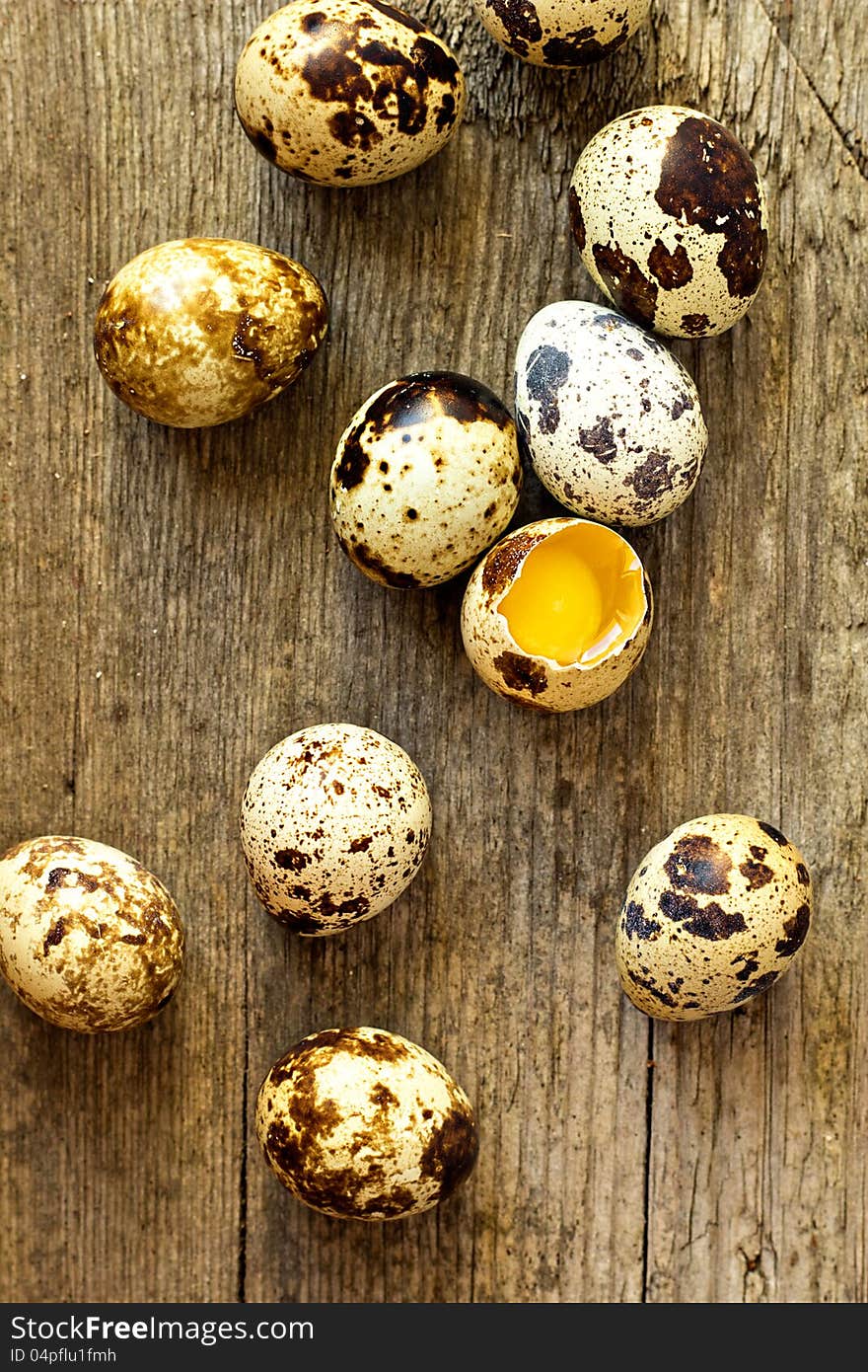 Quail eggs on a wooden table