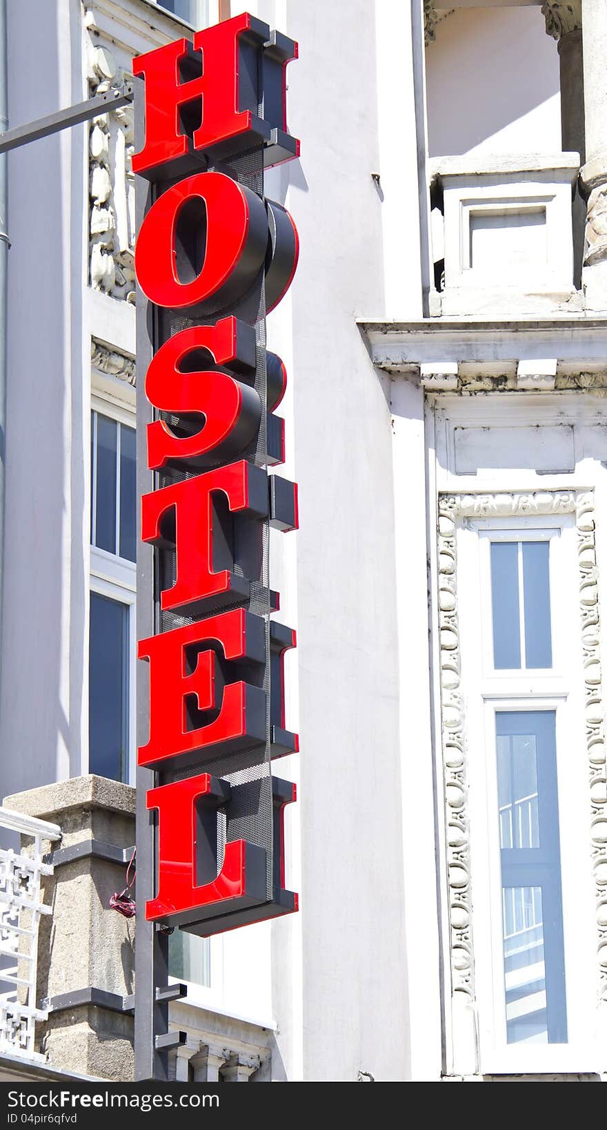 Hostel sign in exterior view, European building