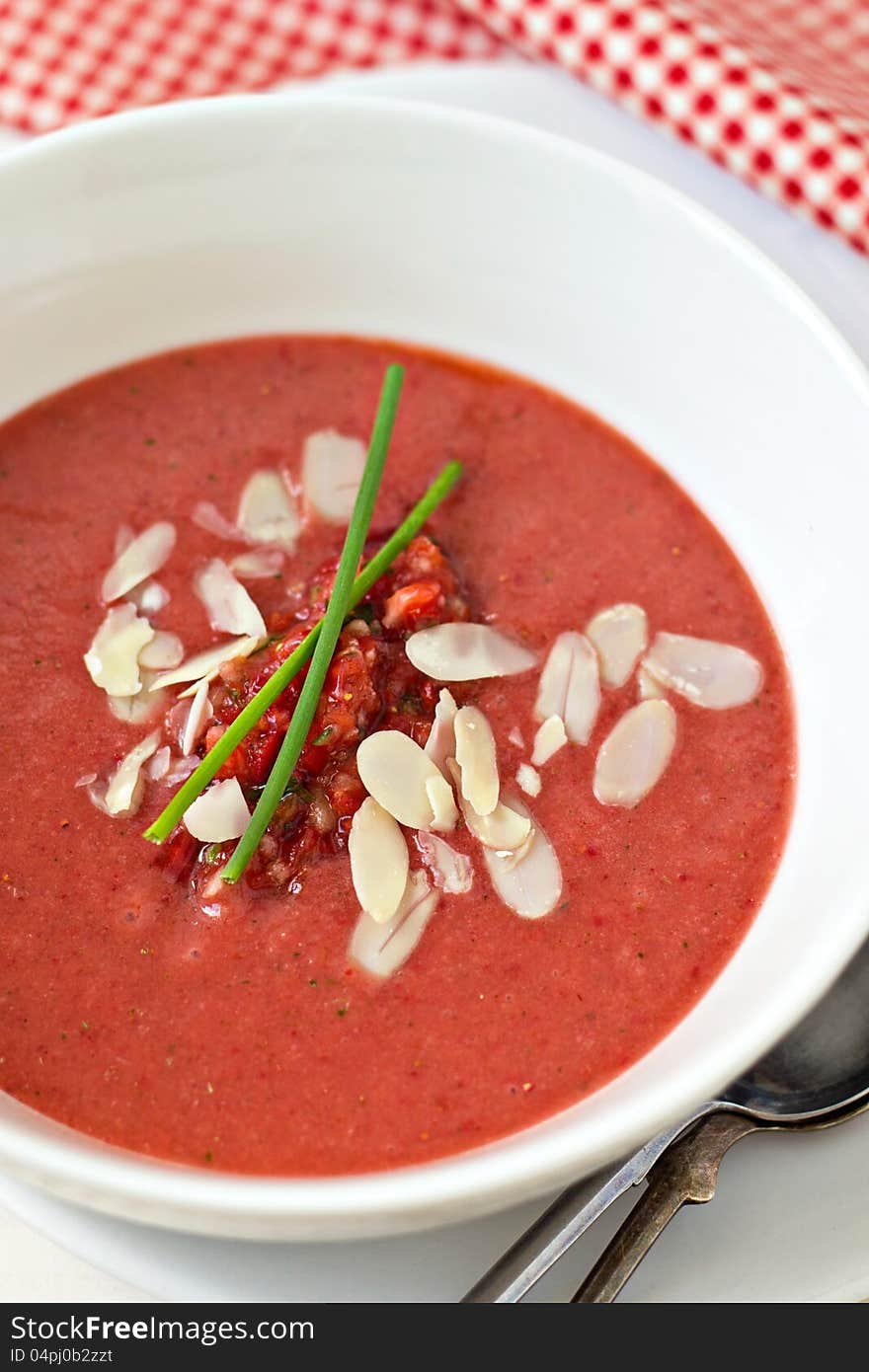 Strawberry gazpacho in a white bowl