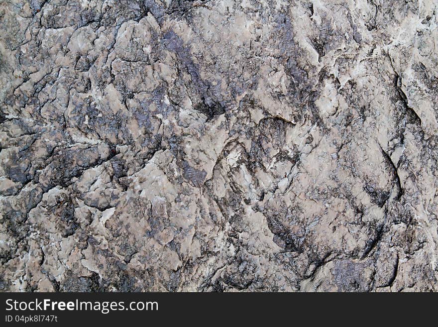 Texture of gray stone wallpaper.