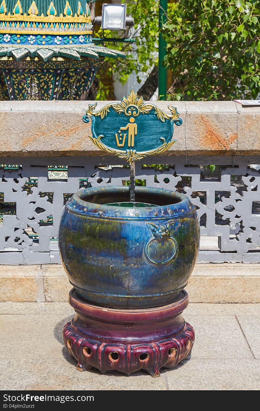 Exotic trash can (garbage bin) with sign in Bangkok, Thailand