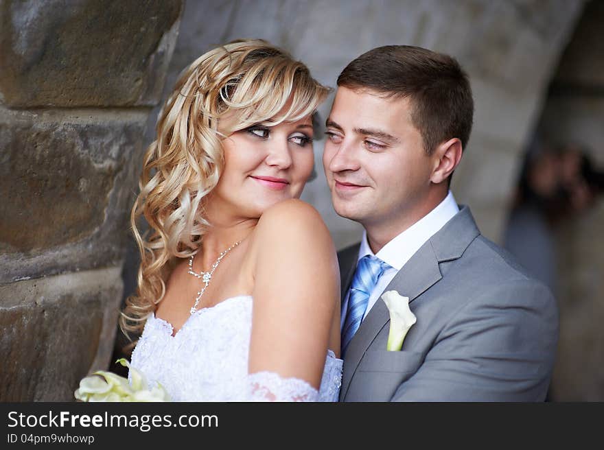 Bride And Groom Look At Each Other