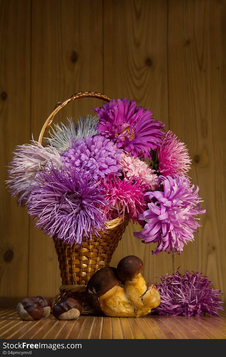 Bouquet of autumn flowers and mushrooms. Bouquet of autumn flowers and mushrooms