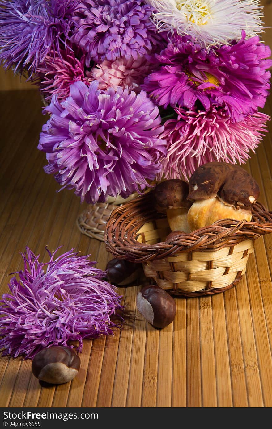 Bouquet of autumn flowers and mushrooms. Bouquet of autumn flowers and mushrooms