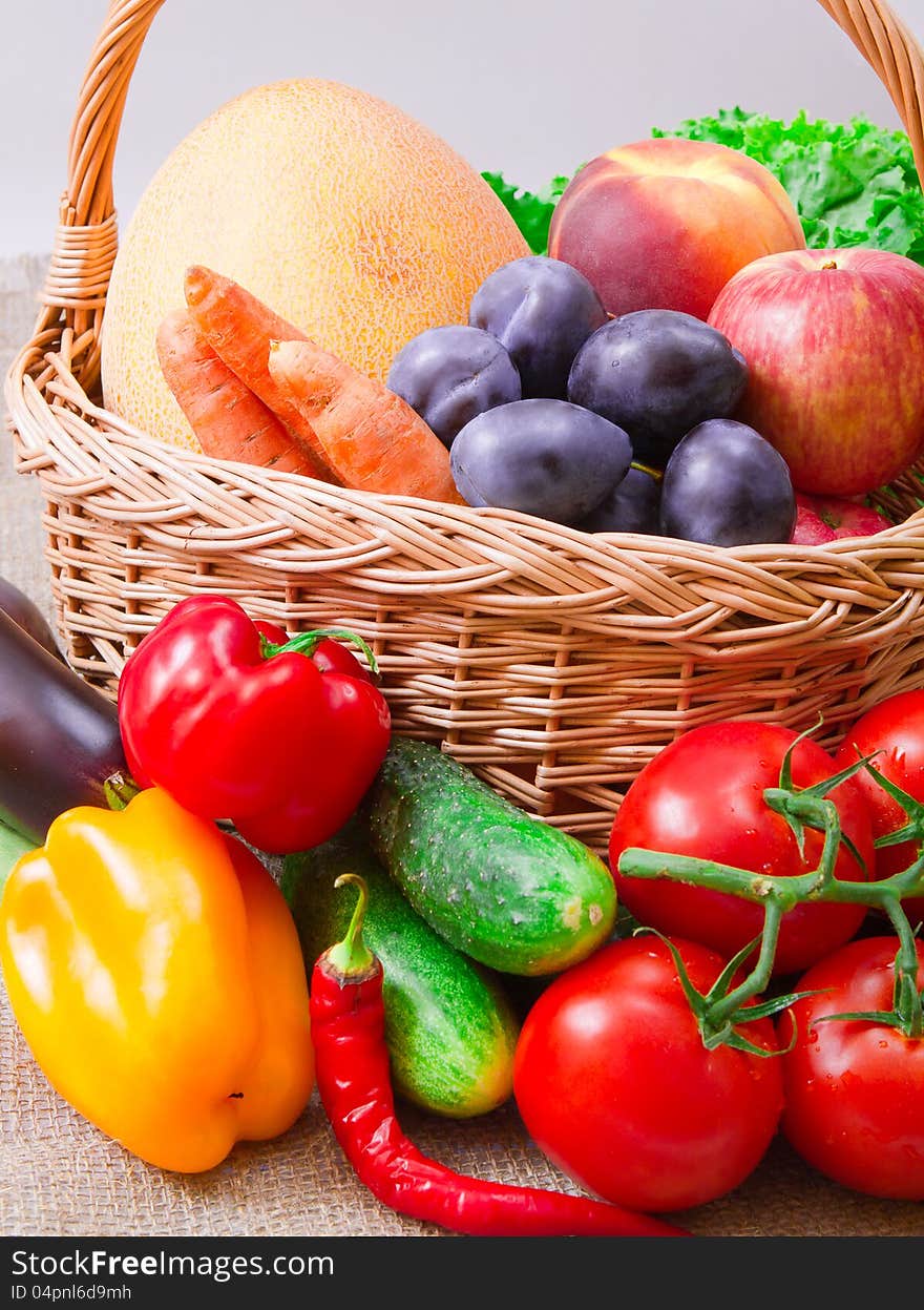 Fruits and vegetables in wattled basket. Fruits and vegetables in wattled basket