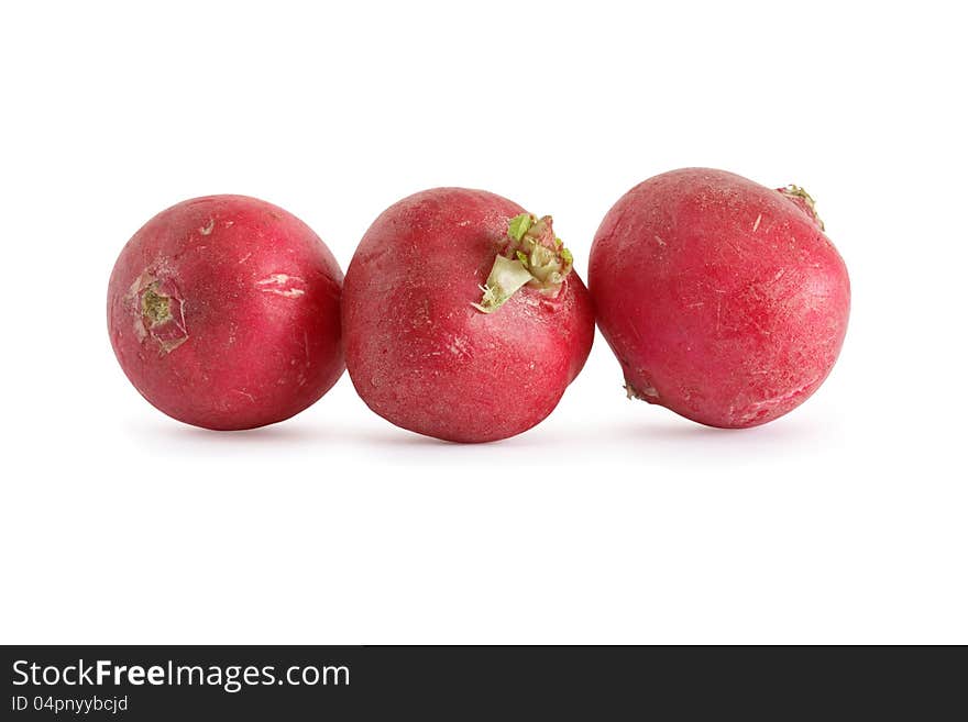 Three red radishes on white background. Clipping path is included. Three red radishes on white background. Clipping path is included