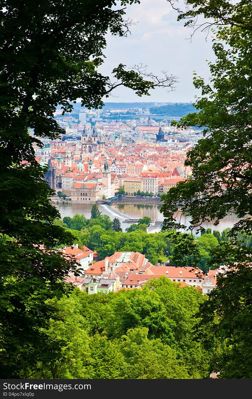 Beautiful Prague seen through trees on a Petrin Hill