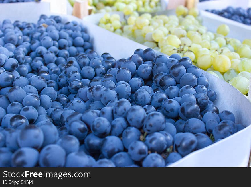 End of Summer, market stalls are full of grapes. End of Summer, market stalls are full of grapes