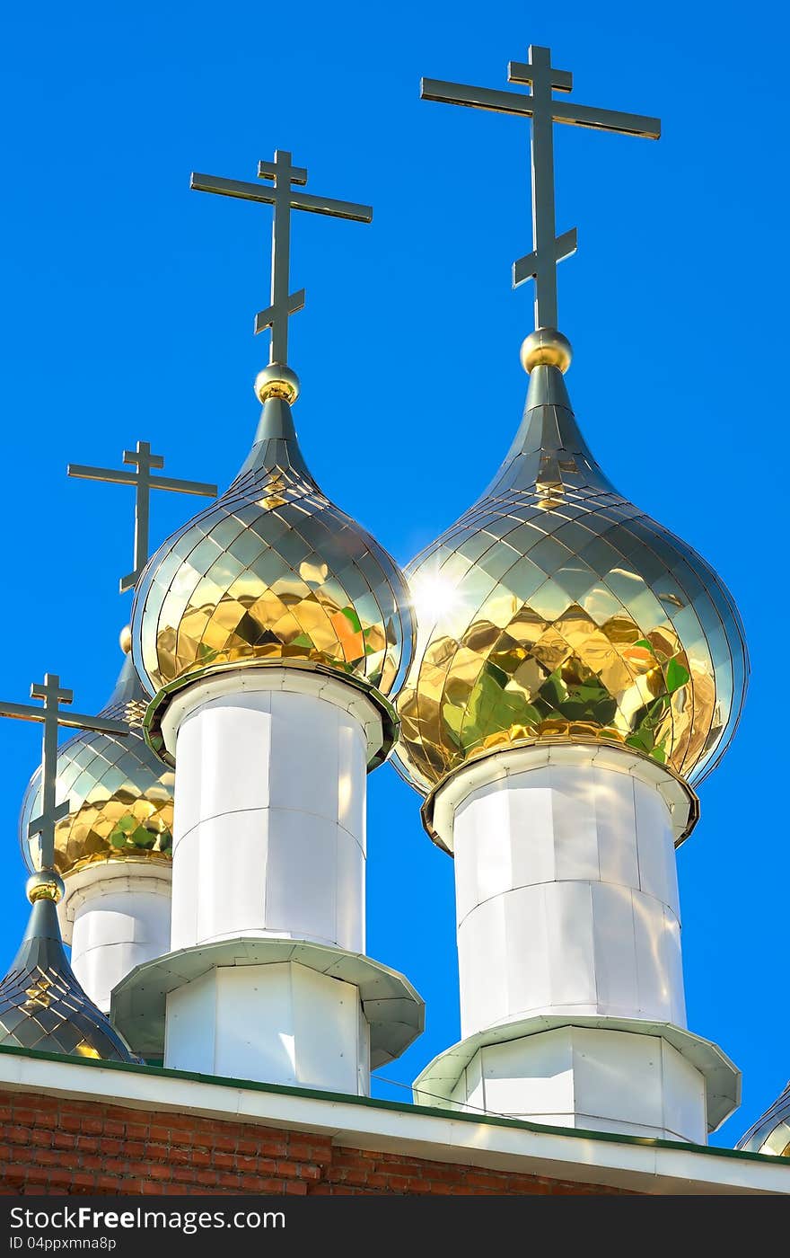 Golden domes against the blue sky. Golden domes against the blue sky.