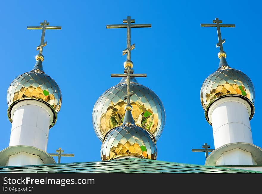 Golden domes against the blue sky. Golden domes against the blue sky.