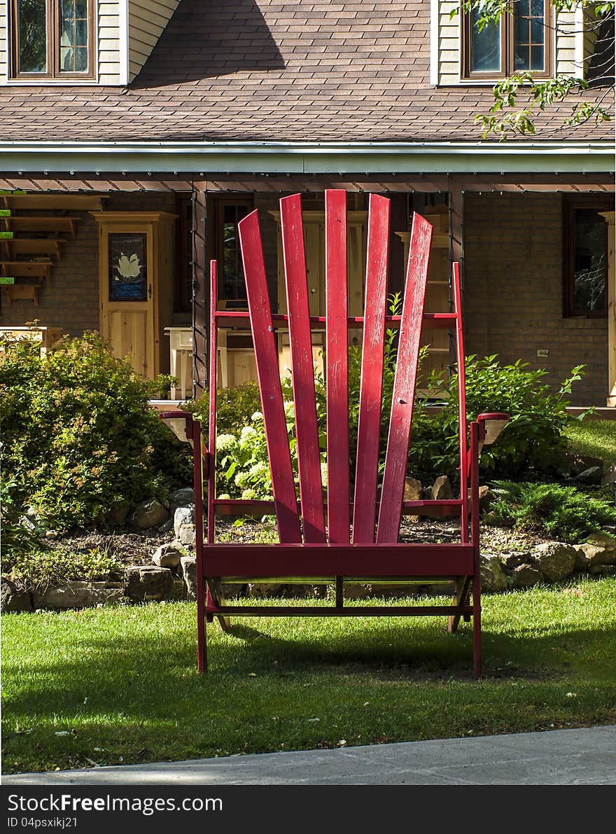 Giant chair in front of a house