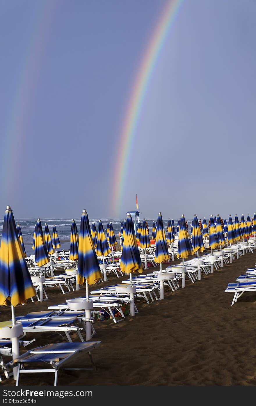 Double Rainbow In A Beach