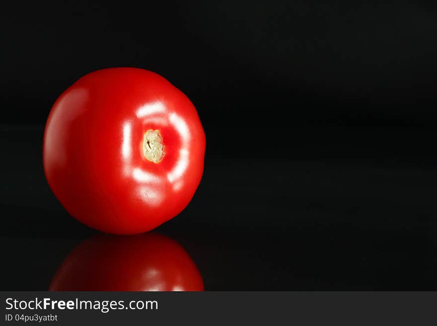 Red Tomato On Black