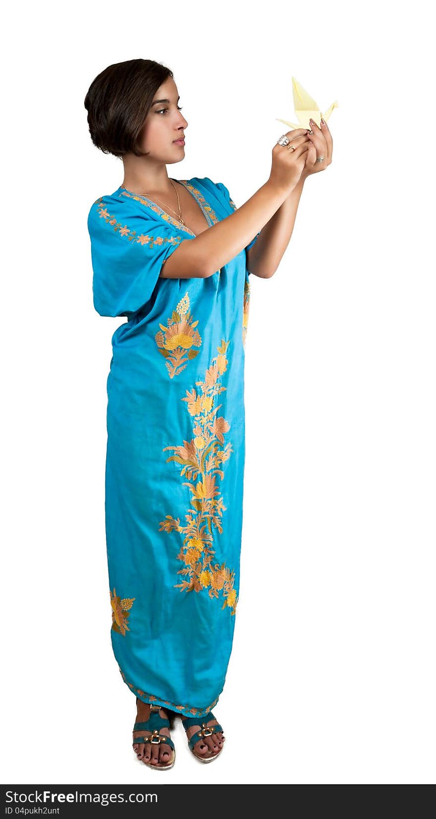 Girl in blue indian dress with oregami