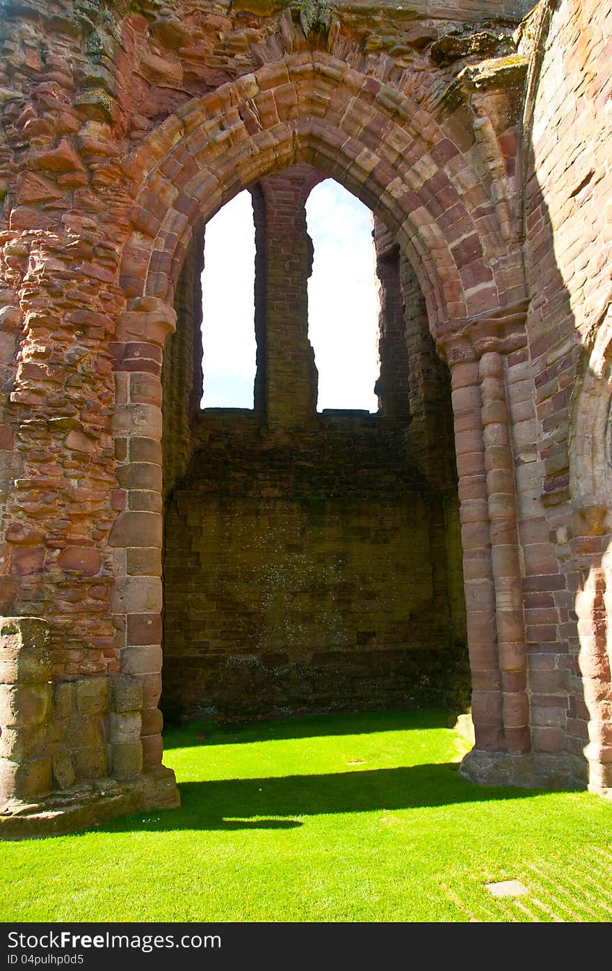 Arbroath Abbey, The West Front Ruins , Arbroath, Angus, Scotland, U.K This Ruins is in Arbroath Town. Arbroath Abbey, in the Scottish town of Arbroath, was founded in 1178 by King William the Lion for a group of Tironensian Benedictine monks from Kelso Abbey. It was consecrated in 1197 with a dedication to the deceased Saint Thomas Becket, whom the king had met at the English court.  It was William&#x27;s only personal foundation — he was buried before the high altar of the church in 1214. The last Abbot was Cardinal David Beaton, who in 1522 succeeded his uncle James to become Archbishop of St Andrews. The Abbey is cared for by Historic Environment Scotland and is open to the public throughout the year &#x28;entrance charge&#x29;. The distinctive red sandstone ruins stand at the top of the High Street in Arbroath
Abbey seal, depicting the murder of St Thomas. King William gave the Abbey independence from its mother church and endowed it generously, including income from 24 parishes, land in every royal burgh and more. The Abbey&#x27;s monks were allowed to run a market and build a harbour. King John of England gave the Abbey permission to buy and sell goods anywhere in England &#x28;except London&#x29; toll-free. The Abbey, which was the richest in Scotland, is most famous for its association with the 1320 Declaration of Scottish Independence believed to have been drafted by Abbot Bernard, who was the Chancellor of Scotland under King Robert I.
The Abbey fell into ruin. Arbroath Abbey, The West Front Ruins , Arbroath, Angus, Scotland, U.K This Ruins is in Arbroath Town. Arbroath Abbey, in the Scottish town of Arbroath, was founded in 1178 by King William the Lion for a group of Tironensian Benedictine monks from Kelso Abbey. It was consecrated in 1197 with a dedication to the deceased Saint Thomas Becket, whom the king had met at the English court.  It was William&#x27;s only personal foundation — he was buried before the high altar of the church in 1214. The last Abbot was Cardinal David Beaton, who in 1522 succeeded his uncle James to become Archbishop of St Andrews. The Abbey is cared for by Historic Environment Scotland and is open to the public throughout the year &#x28;entrance charge&#x29;. The distinctive red sandstone ruins stand at the top of the High Street in Arbroath
Abbey seal, depicting the murder of St Thomas. King William gave the Abbey independence from its mother church and endowed it generously, including income from 24 parishes, land in every royal burgh and more. The Abbey&#x27;s monks were allowed to run a market and build a harbour. King John of England gave the Abbey permission to buy and sell goods anywhere in England &#x28;except London&#x29; toll-free. The Abbey, which was the richest in Scotland, is most famous for its association with the 1320 Declaration of Scottish Independence believed to have been drafted by Abbot Bernard, who was the Chancellor of Scotland under King Robert I.
The Abbey fell into ruin