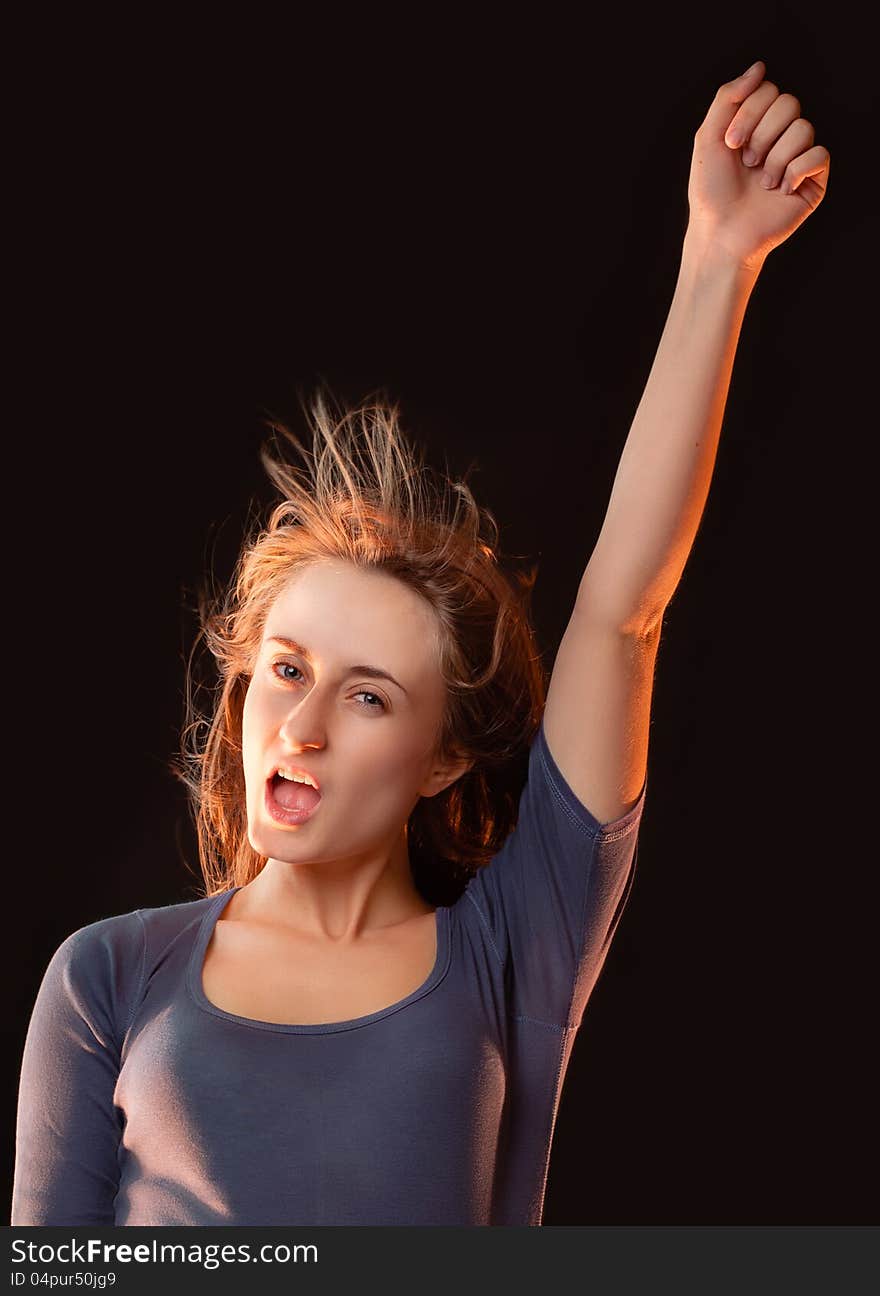 Portrait of emotional girl with her hand raised. Portrait of emotional girl with her hand raised