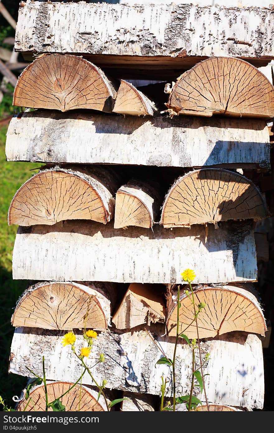 Birch wood in the woodpile. Birch wood in the woodpile.