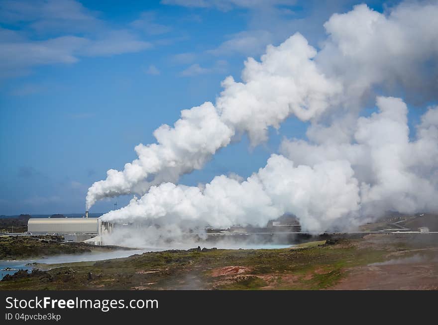 Smoking factory field polluting the air, Iceland