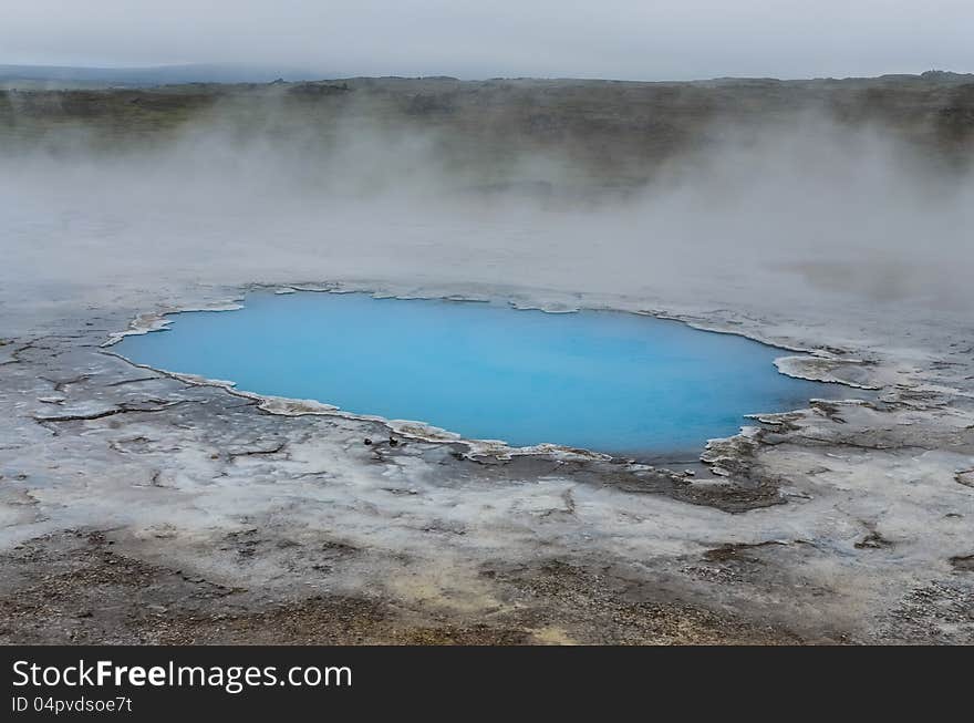 Detail of blue geothermal pond in Hveravellir