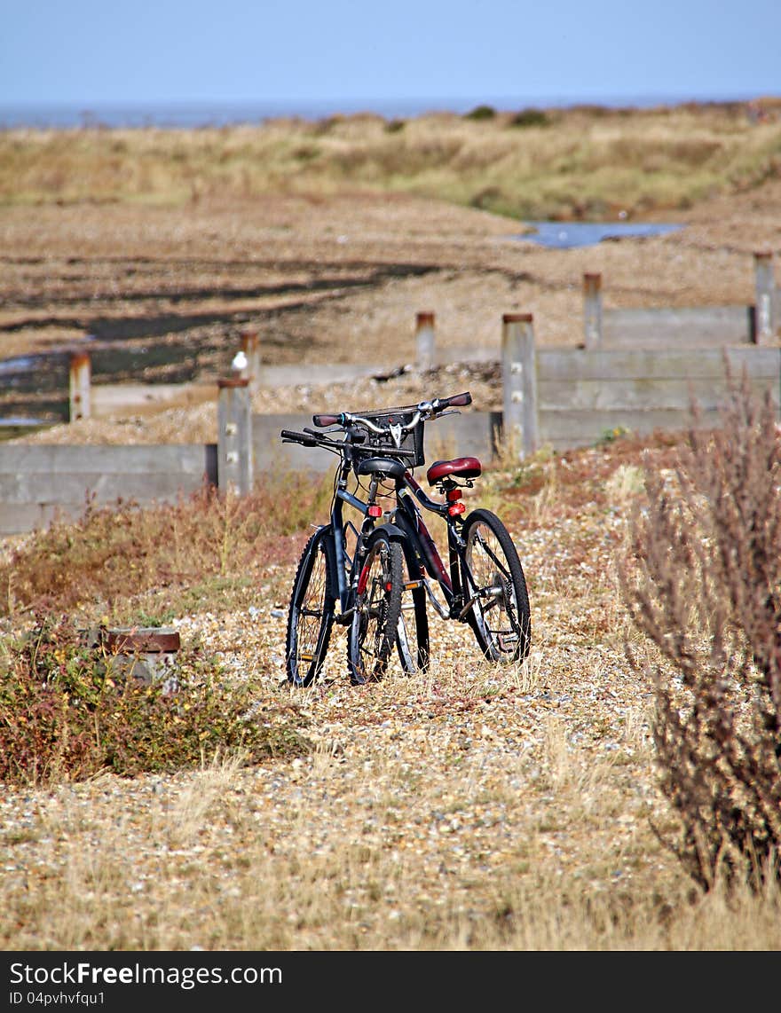 Two Cycles On Beach