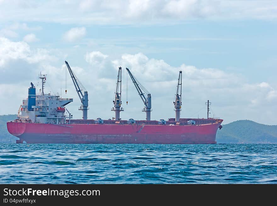 Vessel Cargo With Crane At Mid Of Sichang Island,